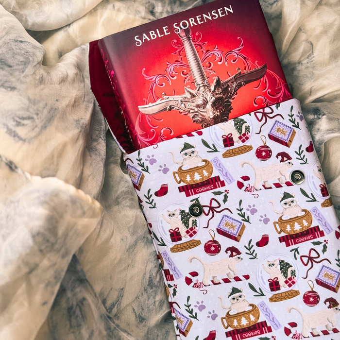 Charlie Christmas padded book sleeve