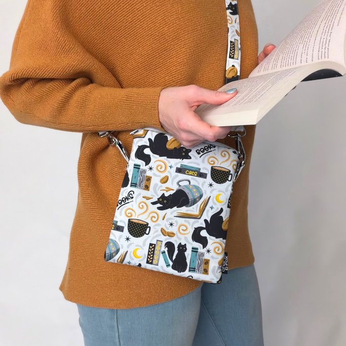 Feline Fables crossbody sleeve