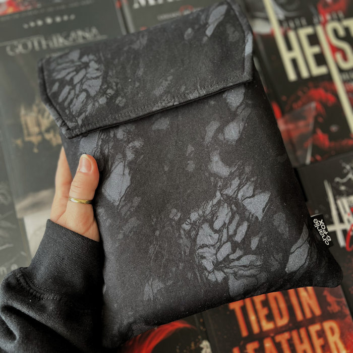 In The Shadows padded book sleeve