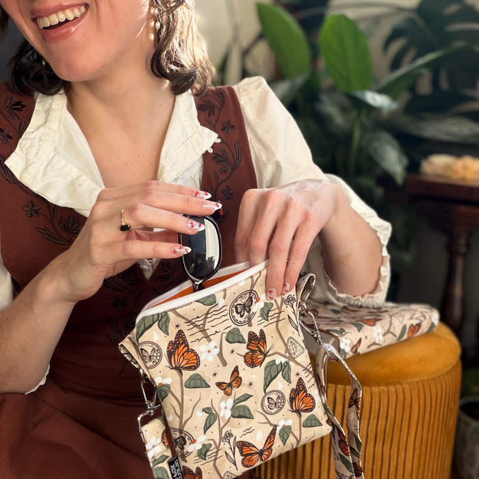 Monarch Story crossbody sleeve