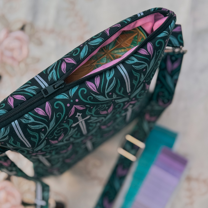 Rivals to Romance crossbody sleeve