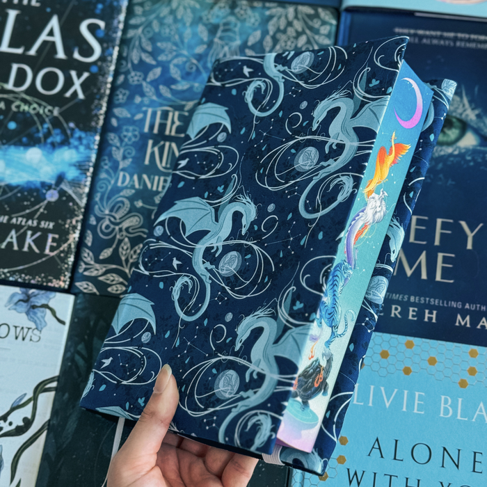 Moonplume Dragon fabric dust jacket (When The Moon Hatched)