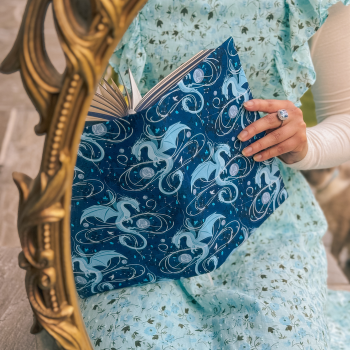 Moonplume Dragon fabric dust jacket (When The Moon Hatched)