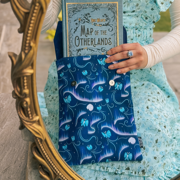 Aurora padded book sleeve (When The Moon Hatched)