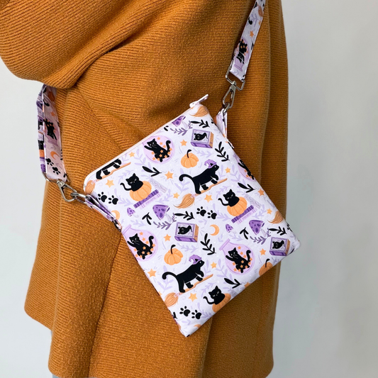 Cats and Magic crossbody sleeve