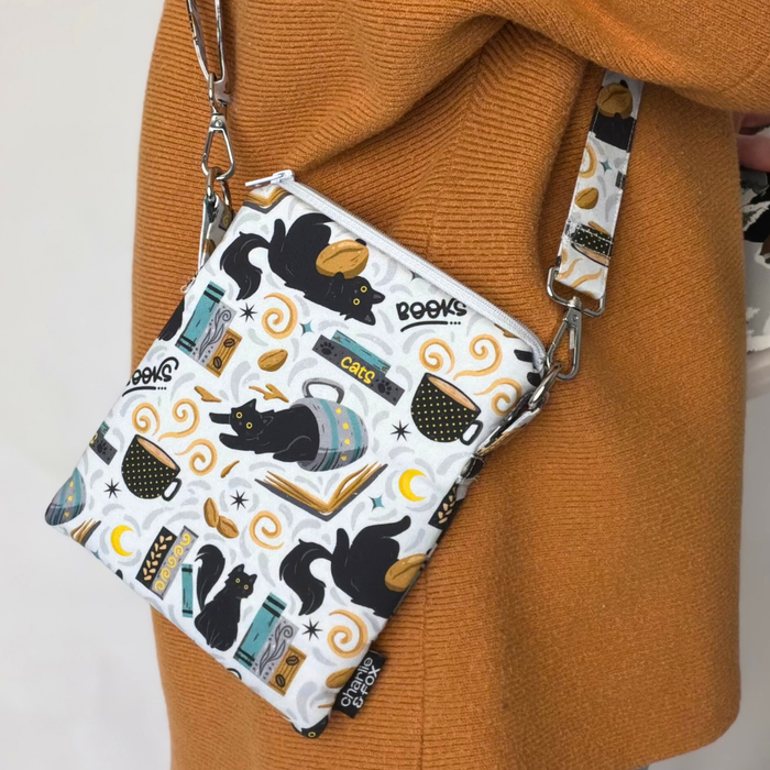 Feline Fables crossbody sleeve