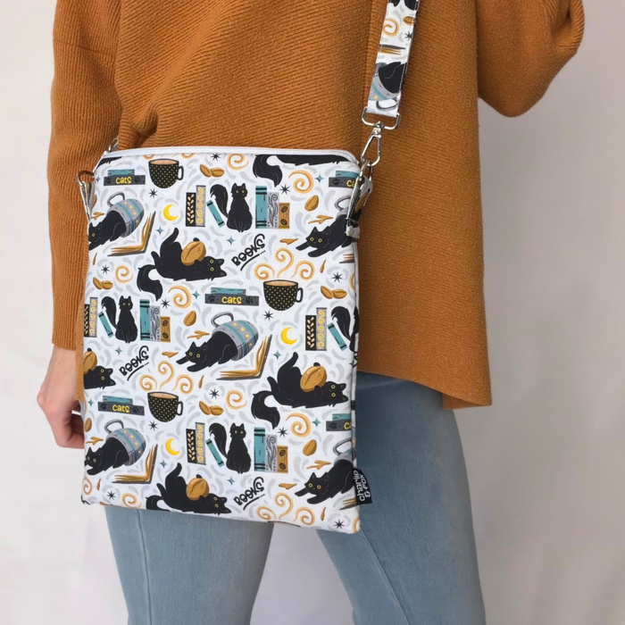 Feline Fables crossbody sleeve