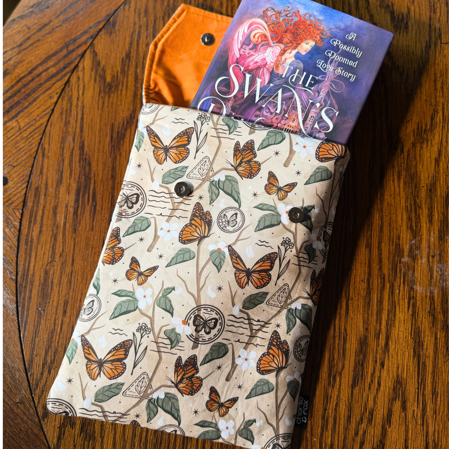 Monarch Story padded book sleeve
