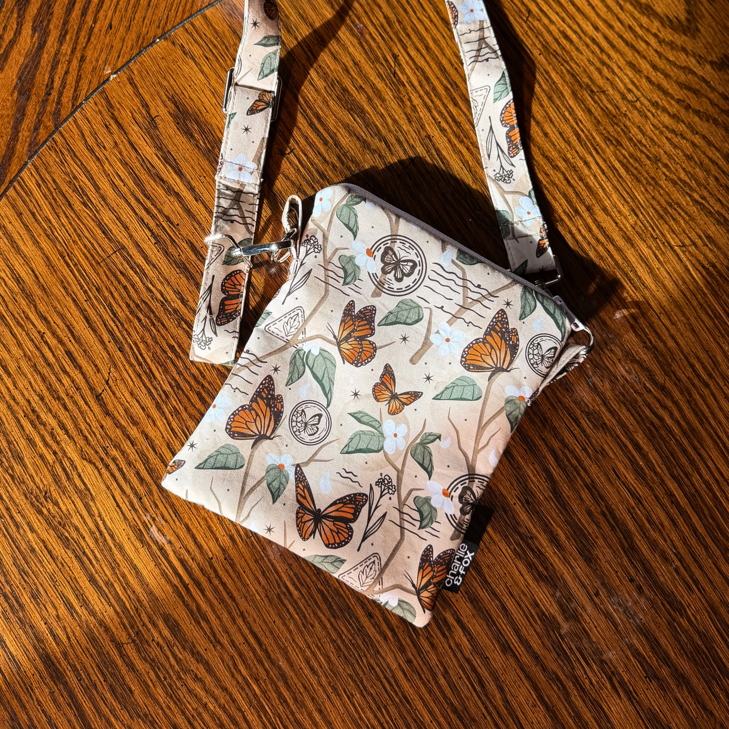 Monarch Story crossbody sleeve