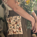 Monarch Story crossbody sleeve