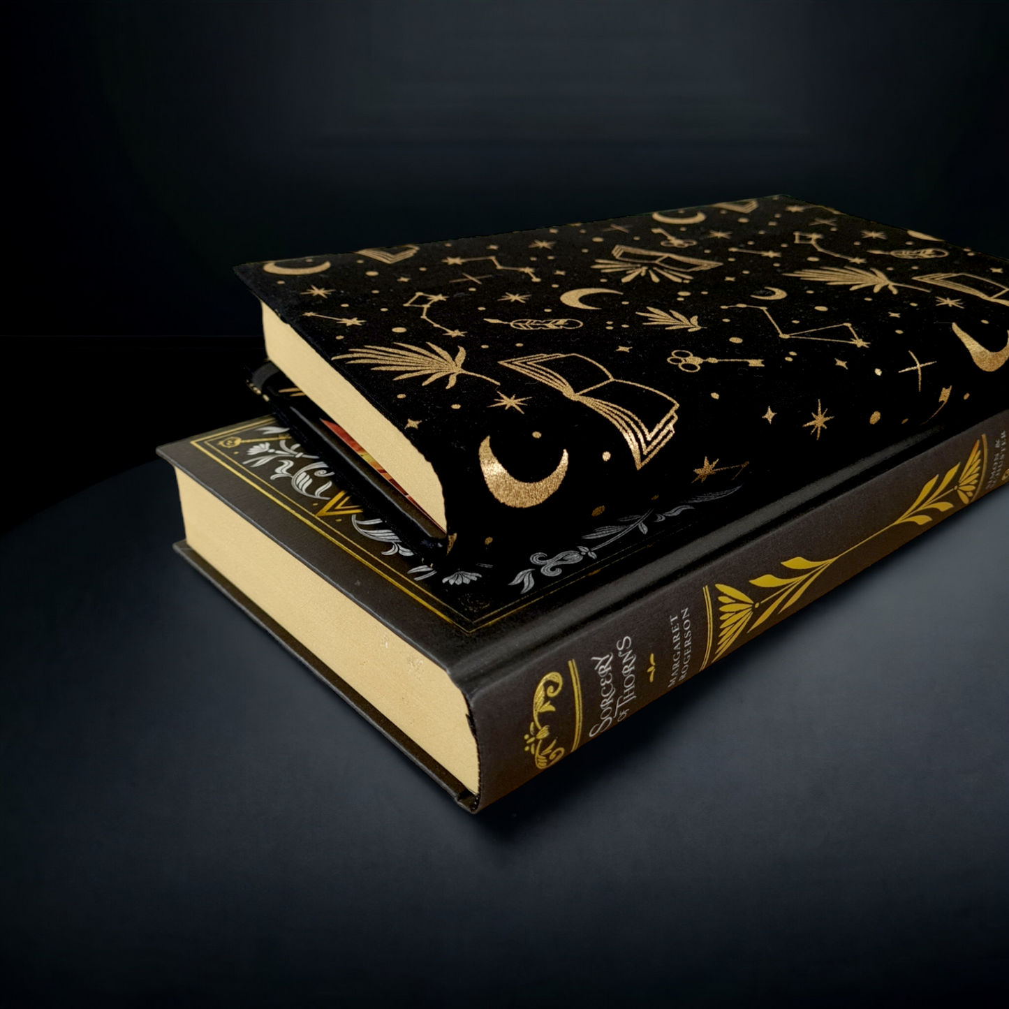 black and gold celestial reading fabric dust jacket book cover