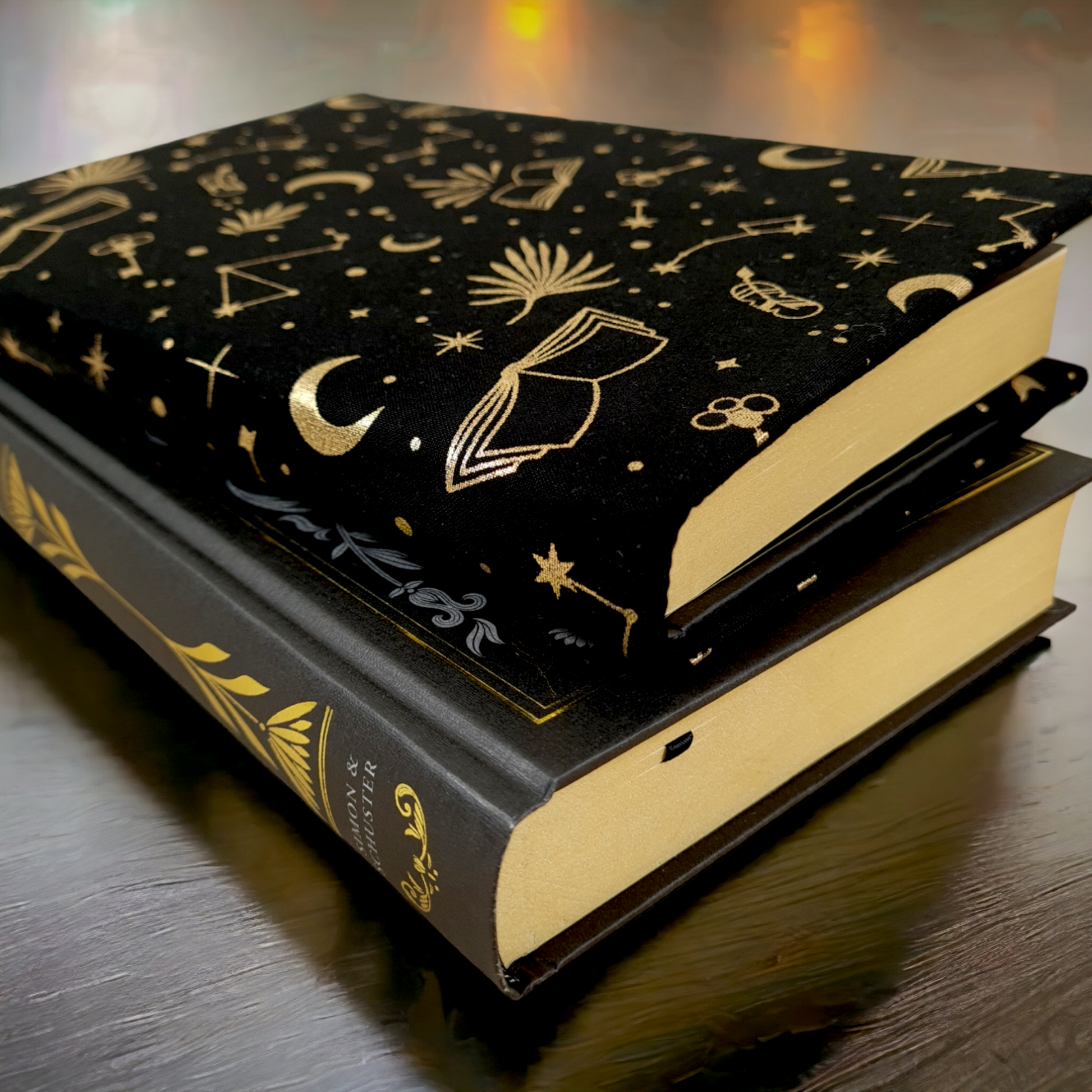 black and gold celestial reading fabric dust jacket book cover