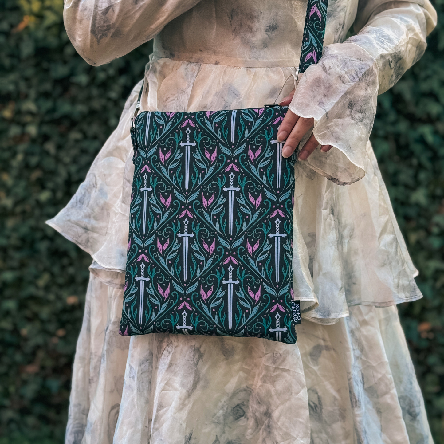 Rivals to Romance crossbody sleeve