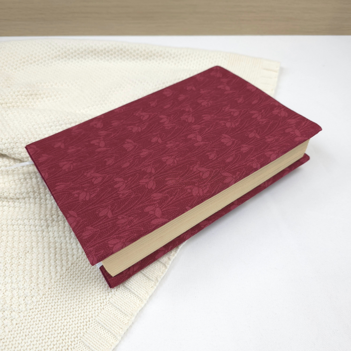 Snowdrops in Berry Red fabric dust jacket