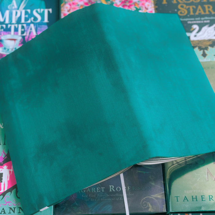 Wonderland in Teal fabric dust jacket