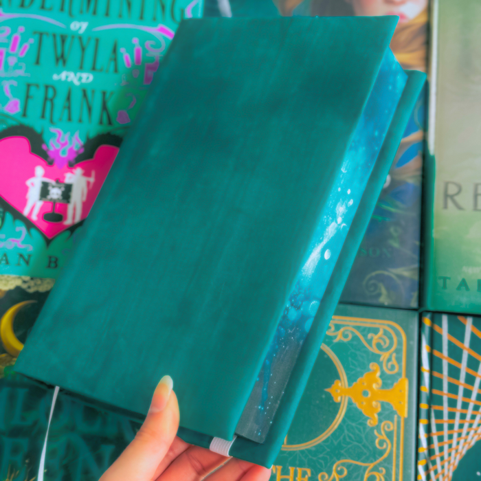 Wonderland in Teal fabric dust jacket