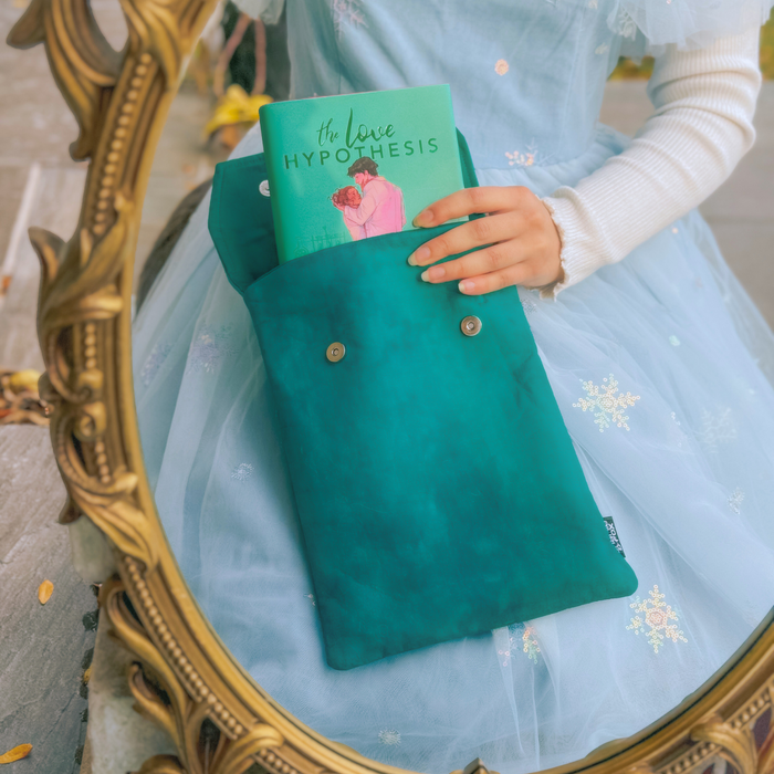 Wonderland in Teal padded book sleeve