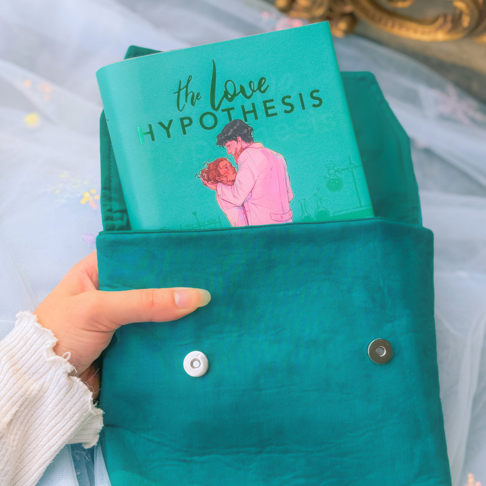 Wonderland in Teal padded book sleeve