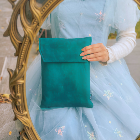 Wonderland in Teal padded book sleeve